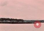 Image of Cranes and buildings near Knik Arm Cook Inlet  Anchorage Alaska USA, 1953, second 60 stock footage video 65675035068