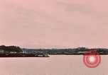 Image of Cranes and buildings near Knik Arm Cook Inlet  Anchorage Alaska USA, 1953, second 62 stock footage video 65675035068