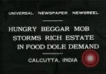 Image of beggars Calcutta India, 1931, second 1 stock footage video 65675035120