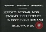 Image of beggars Calcutta India, 1931, second 6 stock footage video 65675035120