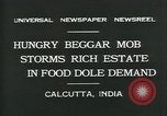 Image of beggars Calcutta India, 1931, second 8 stock footage video 65675035120