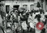 Image of beggars Calcutta India, 1931, second 18 stock footage video 65675035120
