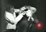 Image of barbers Frankfurt Germany, 1931, second 13 stock footage video 65675035129
