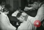 Image of barbers Frankfurt Germany, 1931, second 37 stock footage video 65675035129