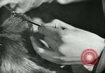 Image of barbers Frankfurt Germany, 1931, second 42 stock footage video 65675035129