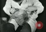 Image of barbers Frankfurt Germany, 1931, second 43 stock footage video 65675035129