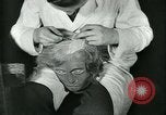 Image of barbers Frankfurt Germany, 1931, second 44 stock footage video 65675035129