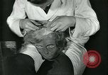 Image of barbers Frankfurt Germany, 1931, second 46 stock footage video 65675035129