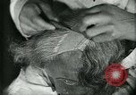 Image of barbers Frankfurt Germany, 1931, second 49 stock footage video 65675035129