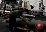 Image of USS Midway Vietnam, 1965, second 12 stock footage video 65675035288