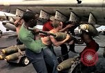 Image of USS Midway Vietnam, 1965, second 27 stock footage video 65675035288