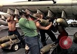 Image of USS Midway Vietnam, 1965, second 28 stock footage video 65675035288
