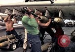 Image of USS Midway Vietnam, 1965, second 29 stock footage video 65675035288