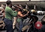 Image of USS Midway Vietnam, 1965, second 33 stock footage video 65675035288