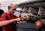 Image of USS Midway Vietnam, 1965, second 51 stock footage video 65675035288