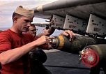 Image of USS Midway Vietnam, 1965, second 52 stock footage video 65675035288