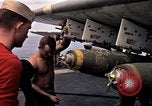 Image of USS Midway Vietnam, 1965, second 56 stock footage video 65675035288