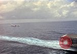 Image of USS Midway South China Sea, 1965, second 4 stock footage video 65675035290