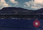 Image of ship burns Saipan Northern Mariana Islands, 1944, second 14 stock footage video 65675035298