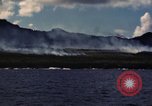 Image of ship burns Saipan Northern Mariana Islands, 1944, second 21 stock footage video 65675035298