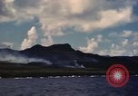 Image of ship burns Saipan Northern Mariana Islands, 1944, second 35 stock footage video 65675035298