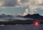 Image of ship burns Saipan Northern Mariana Islands, 1944, second 37 stock footage video 65675035298