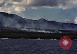 Image of ship burns Saipan Northern Mariana Islands, 1944, second 41 stock footage video 65675035298