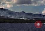 Image of ship burns Saipan Northern Mariana Islands, 1944, second 42 stock footage video 65675035298