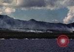 Image of ship burns Saipan Northern Mariana Islands, 1944, second 46 stock footage video 65675035298