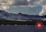 Image of ship burns Saipan Northern Mariana Islands, 1944, second 47 stock footage video 65675035298
