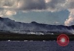 Image of ship burns Saipan Northern Mariana Islands, 1944, second 49 stock footage video 65675035298