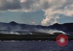 Image of ship burns Saipan Northern Mariana Islands, 1944, second 52 stock footage video 65675035298
