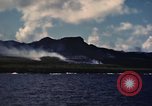 Image of ship burns Saipan Northern Mariana Islands, 1944, second 54 stock footage video 65675035298