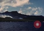 Image of ship burns Saipan Northern Mariana Islands, 1944, second 56 stock footage video 65675035298