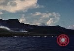 Image of ship burns Saipan Northern Mariana Islands, 1944, second 58 stock footage video 65675035298