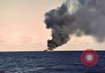 Image of ship burns Saipan Northern Mariana Islands, 1944, second 62 stock footage video 65675035298