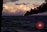 Image of ships burn Saipan Northern Mariana Islands, 1944, second 3 stock footage video 65675035299