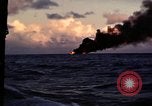 Image of ships burn Saipan Northern Mariana Islands, 1944, second 4 stock footage video 65675035299
