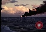 Image of ships burn Saipan Northern Mariana Islands, 1944, second 5 stock footage video 65675035299