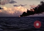 Image of ships burn Saipan Northern Mariana Islands, 1944, second 6 stock footage video 65675035299