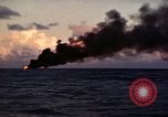 Image of ships burn Saipan Northern Mariana Islands, 1944, second 8 stock footage video 65675035299
