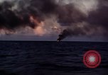 Image of ships burn Saipan Northern Mariana Islands, 1944, second 11 stock footage video 65675035299