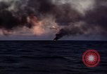 Image of ships burn Saipan Northern Mariana Islands, 1944, second 13 stock footage video 65675035299