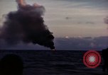 Image of ships burn Saipan Northern Mariana Islands, 1944, second 15 stock footage video 65675035299