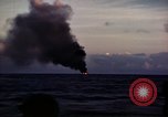 Image of ships burn Saipan Northern Mariana Islands, 1944, second 16 stock footage video 65675035299