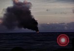 Image of ships burn Saipan Northern Mariana Islands, 1944, second 17 stock footage video 65675035299