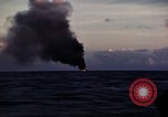 Image of ships burn Saipan Northern Mariana Islands, 1944, second 19 stock footage video 65675035299