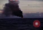 Image of ships burn Saipan Northern Mariana Islands, 1944, second 20 stock footage video 65675035299
