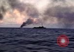 Image of ships burn Saipan Northern Mariana Islands, 1944, second 23 stock footage video 65675035299