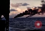 Image of ships burn Saipan Northern Mariana Islands, 1944, second 29 stock footage video 65675035299